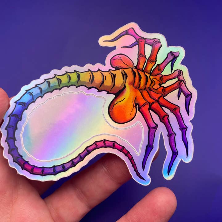 Rainbow Facehugger Alien - Holographic Vinyl Sticker for wholesale by Live Flashy or Die