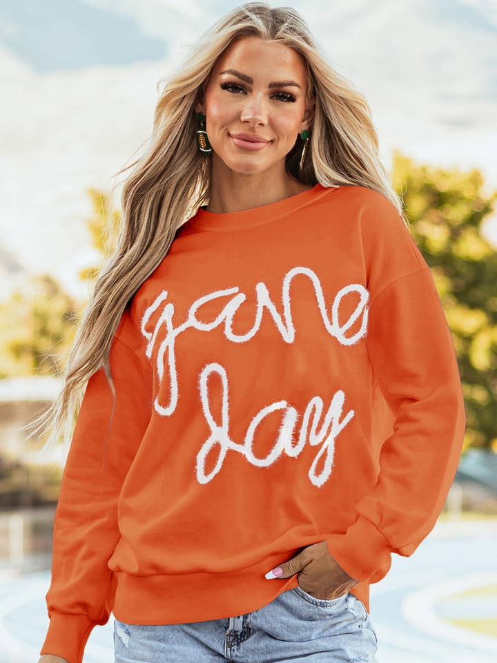 Russet Orange Tinsel Game Day Drop Shoulder Graphic Sweatshirt for wholesale by Azzurro