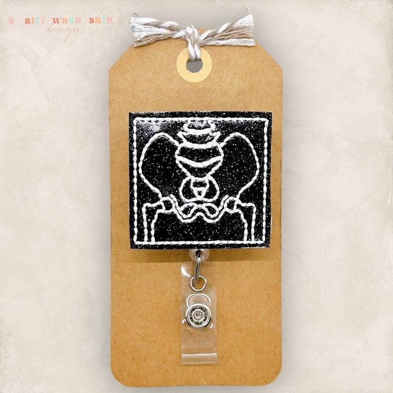 The SmallTownSunshine Company – wholesale Badge accessory – Women's – Pelvic X- Ray Badge Reel0