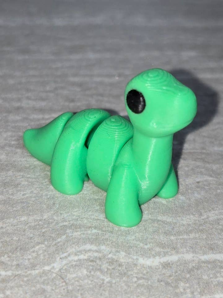 Brontosauro stampato in 3D | Statuetta articolata | Flexi Animal per la vendita all'ingrosso da parte di Cosmic 3D Creations