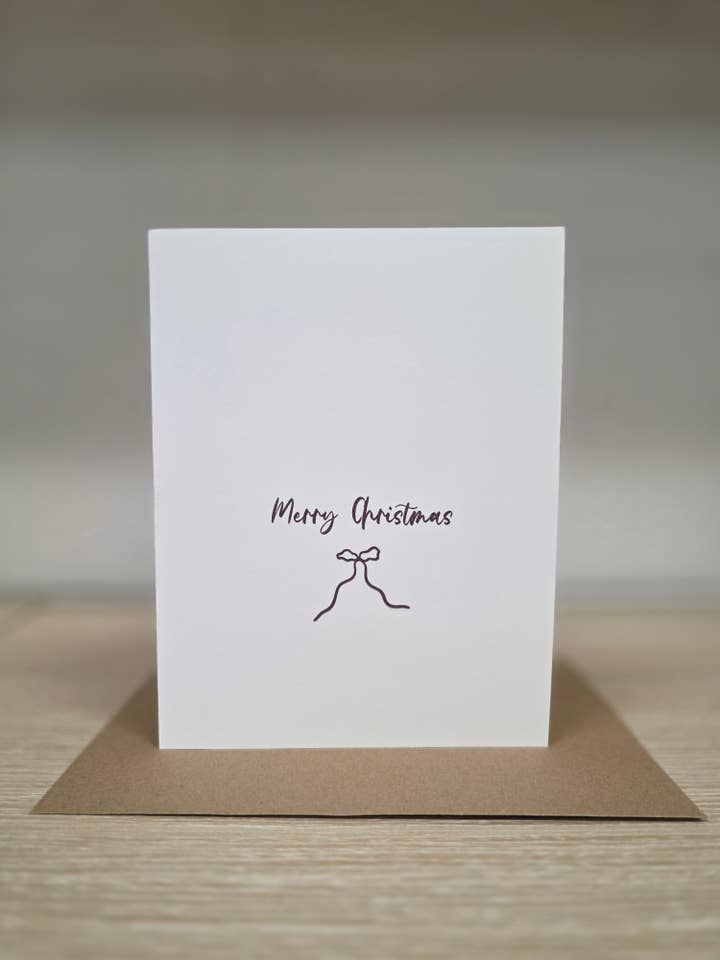 Merry Christmas Bow Greeting Card for wholesale by Covered With Art