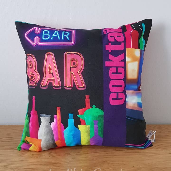 Dekorative pude med farverige urbane motiver for engroshandel hos Les P'tits Coussins