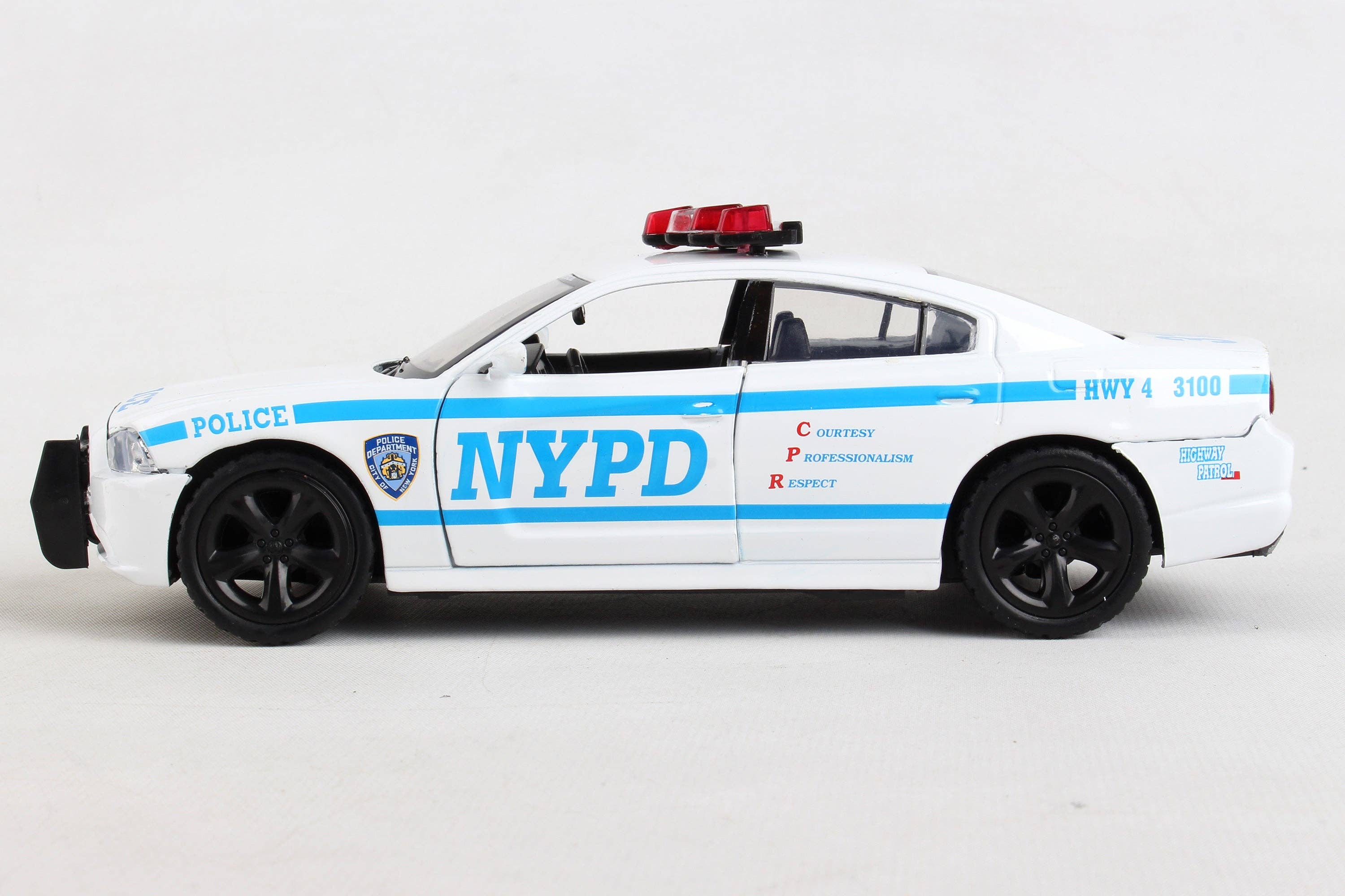 Daron Worldwide Trading – Großhandel Spielzeugauto – Kinder – NY71693 NYPD Dodge Charger 1:24 von Daron Toys4