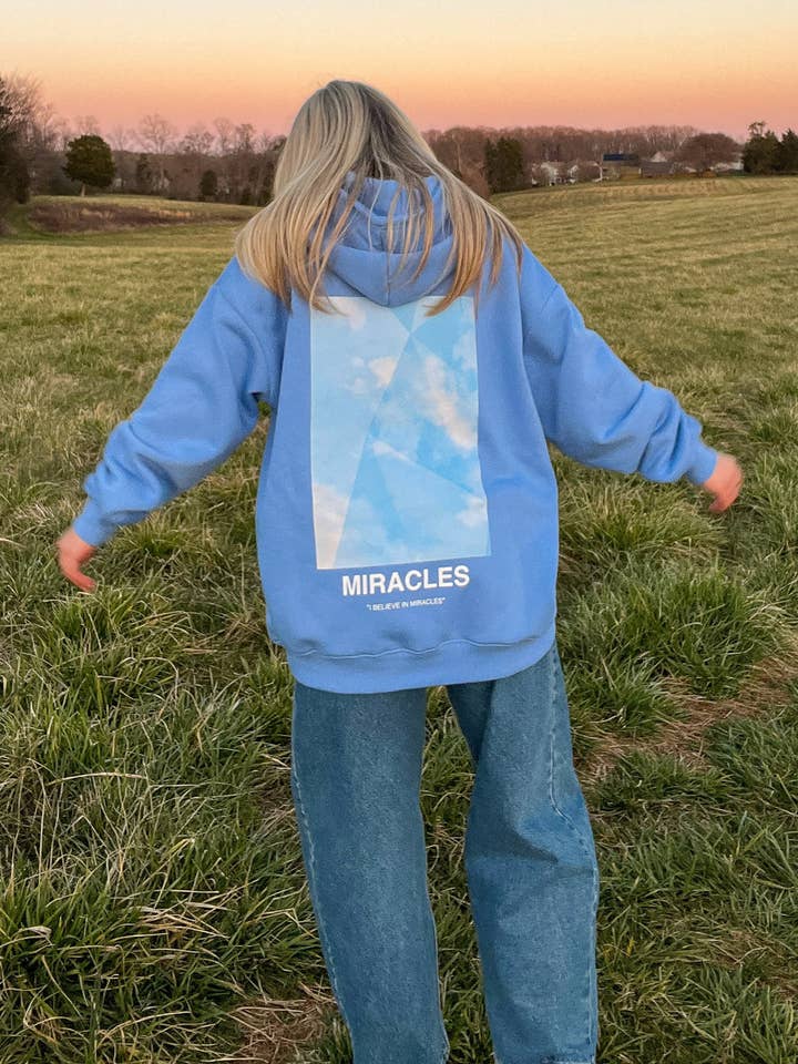 Hoodie Unissexo Azul Milagres por atacado de Elevated Faith