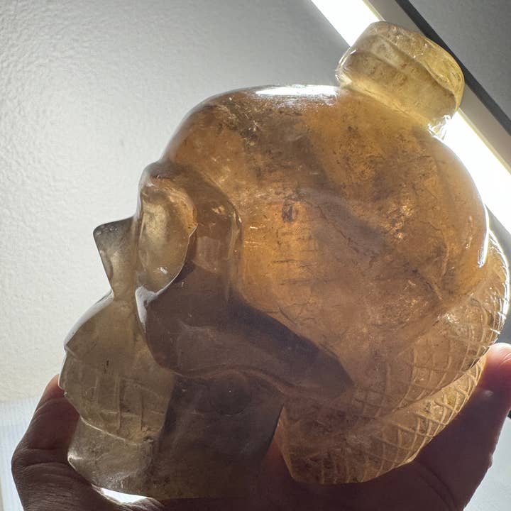 The 7 Directions - Wholesale Spiritual Stone/Crystal - 3.9 lb Unique Smoky skull w/ snake carving H3611