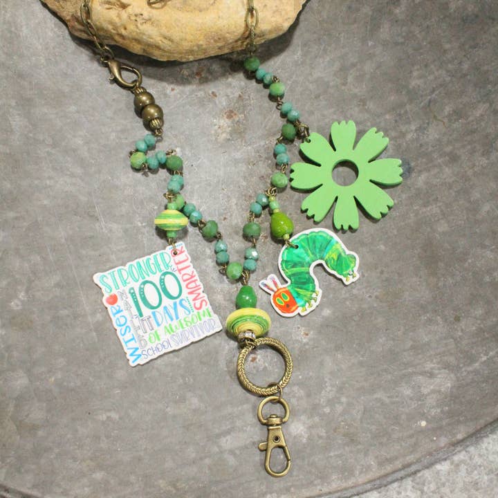 100 Days Smarter Charm'd Teacher Lanyard for wholesale by The Primitive Peddler, Inc.