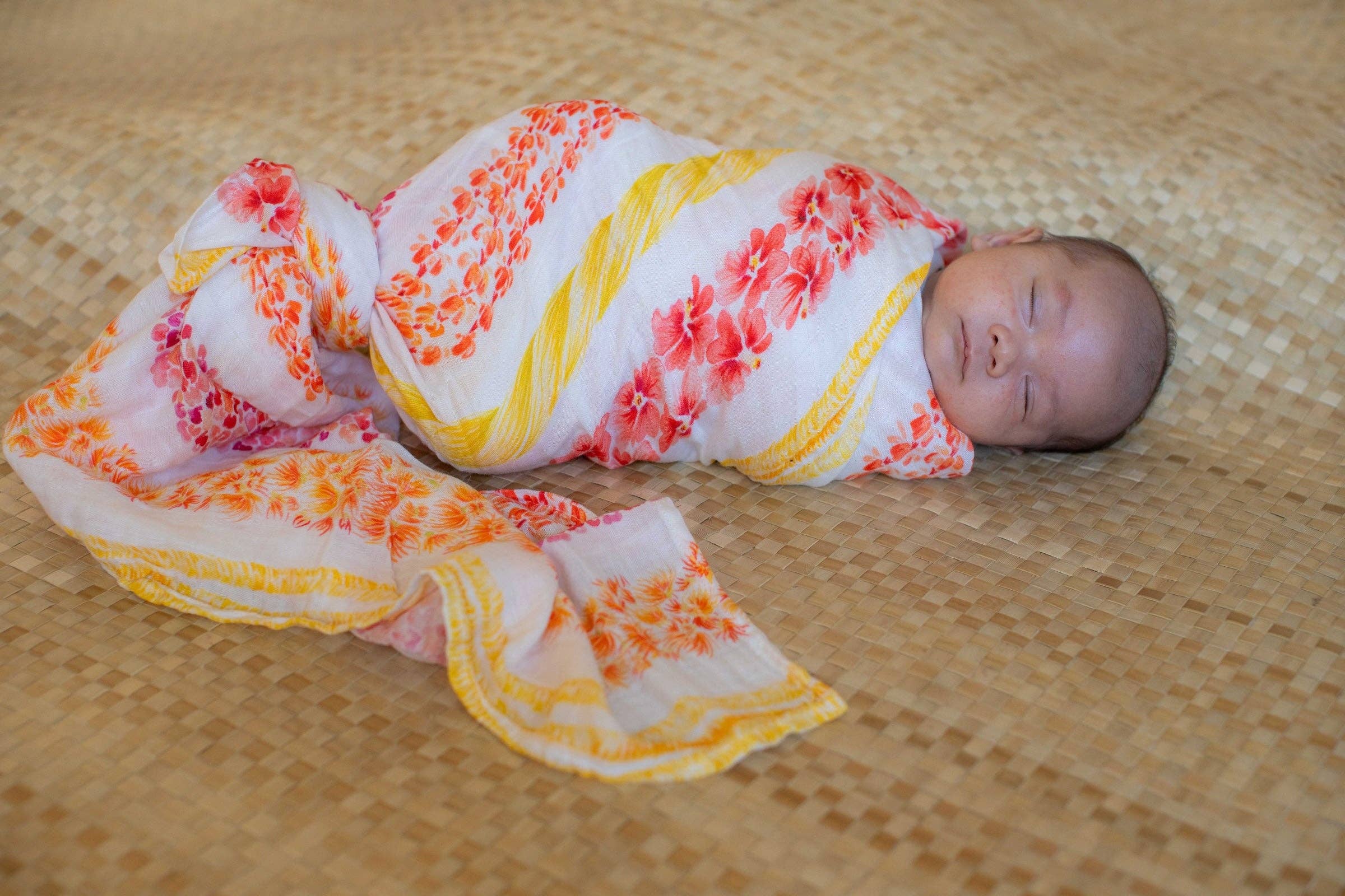 The Keiki Dept – wholesale Swaddle – Baby – Lei Alaula ʻUlaʻula Kapa Moe - Hawaiian Bamboo Swaddle1