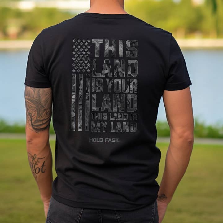Black HOLD FAST Mens T-Shirt This Land for wholesale on Faire