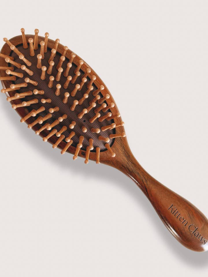 Natural Sandalwood Detangling Hair Brush for wholesale by Kitten Claws Clips