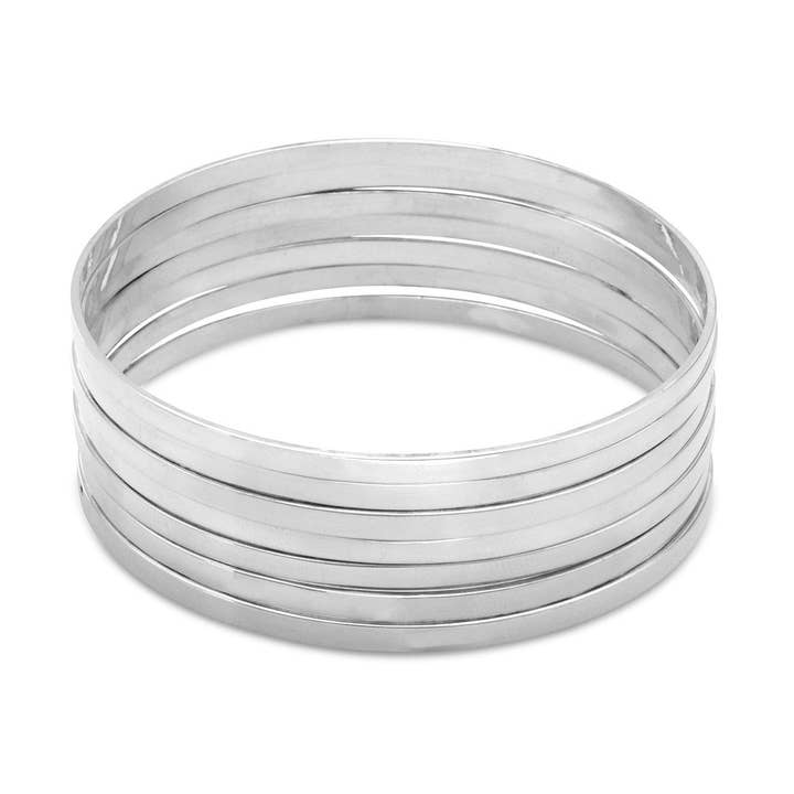 Ensemble de sept bracelets plats de 8 po pour la vente par Silver Stars Collection