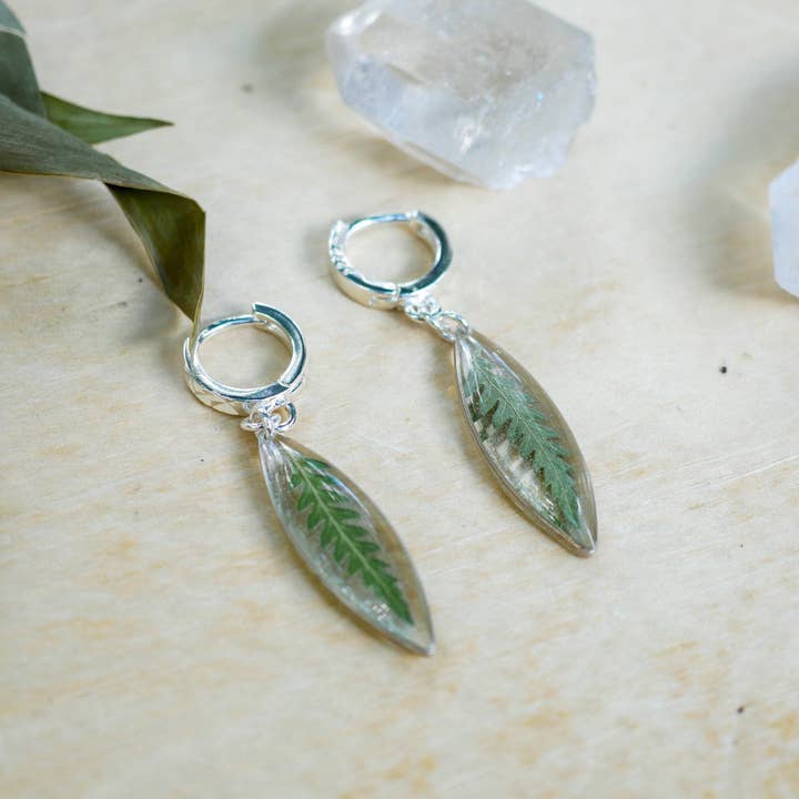 Pressed Fern ellipse huggy hoop earrings, real fern sterling silver hoops for wholesale by Remedy Designs