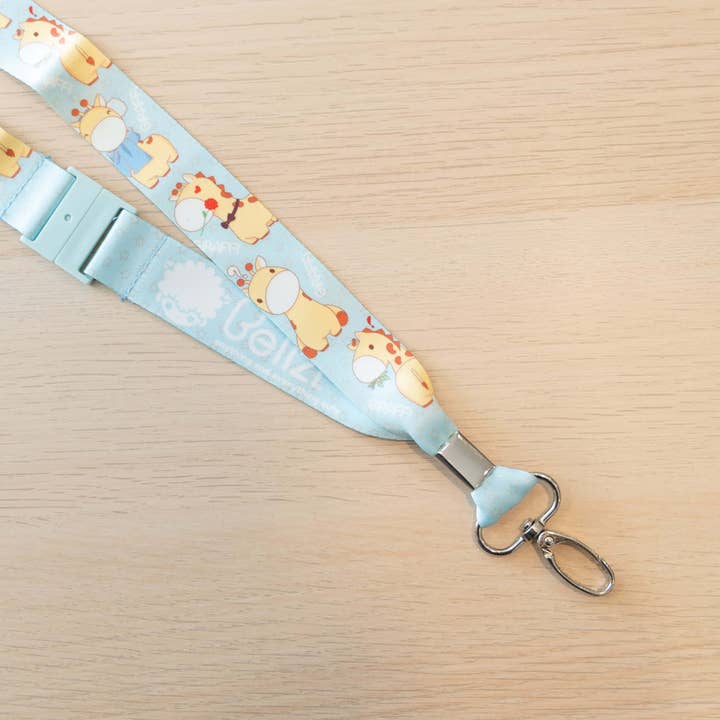 Porte-clés et badge en forme de girafe pour la vente par Bellzi