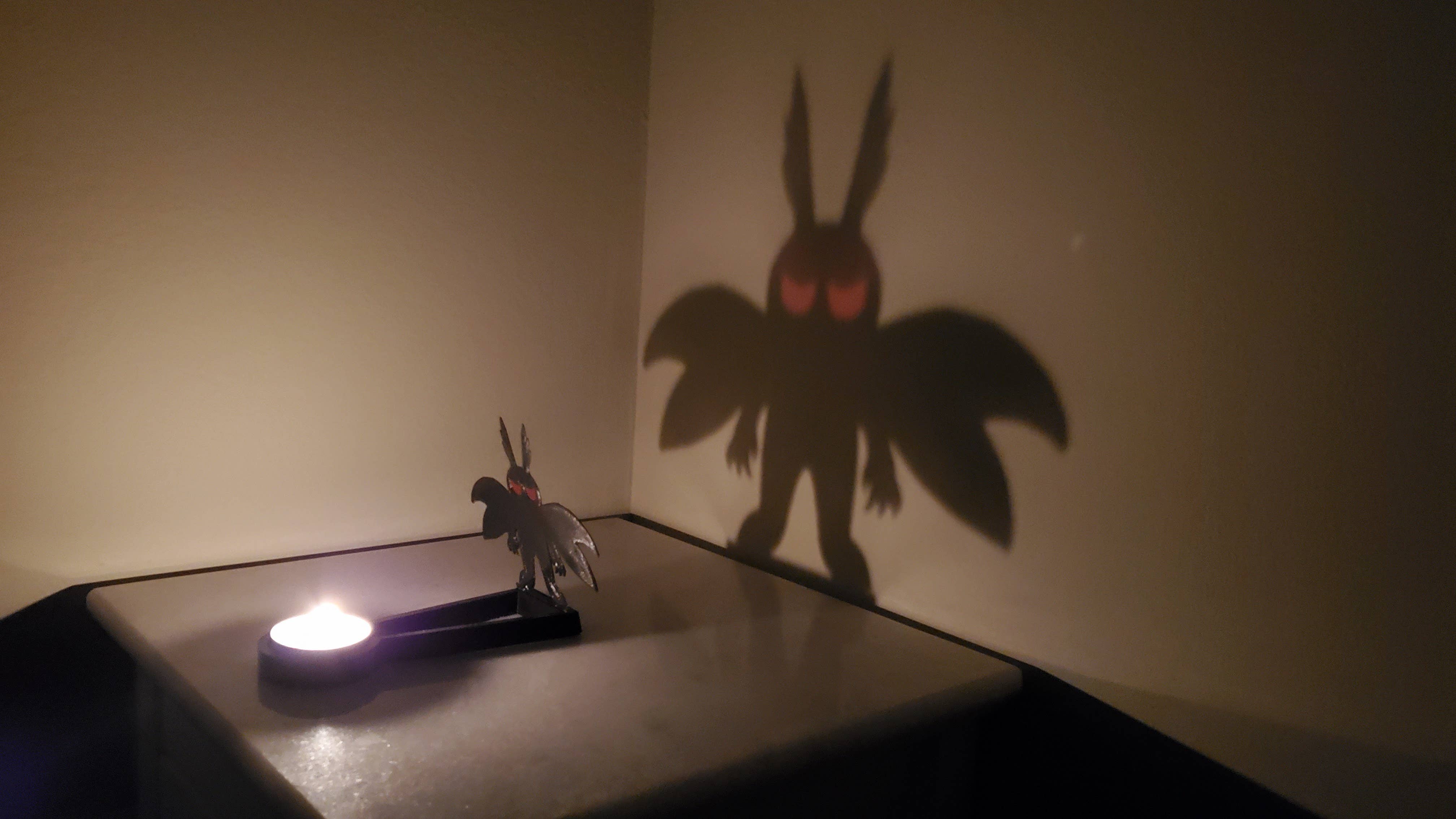 KeaLite - Wholesale Decorative Tabletop Object - KeaLite Red Eyed Mothman Shadow Caster and KeaLite Stand