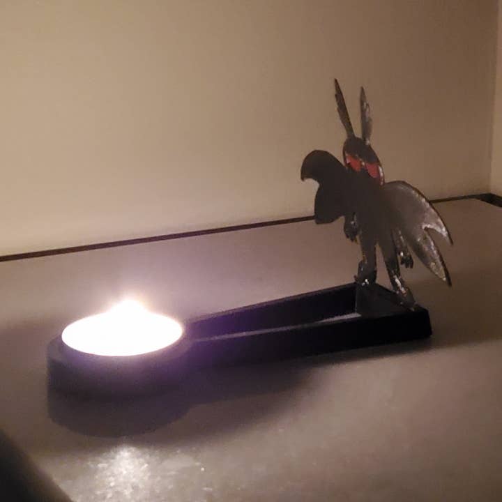 KeaLite - Wholesale Decorative Tabletop Object - KeaLite Red Eyed Mothman Shadow Caster and KeaLite Stand0