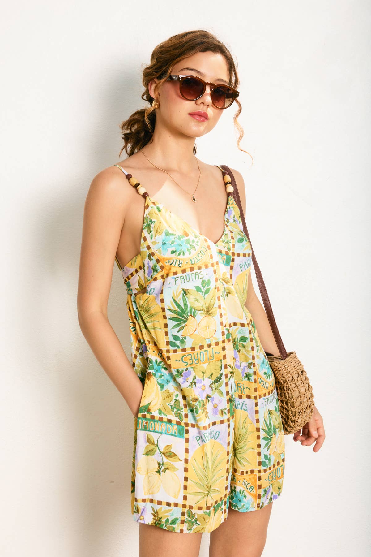 TROPICAL SUN Isla Palma Tie Back Detail Romper for wholesale on Faire1