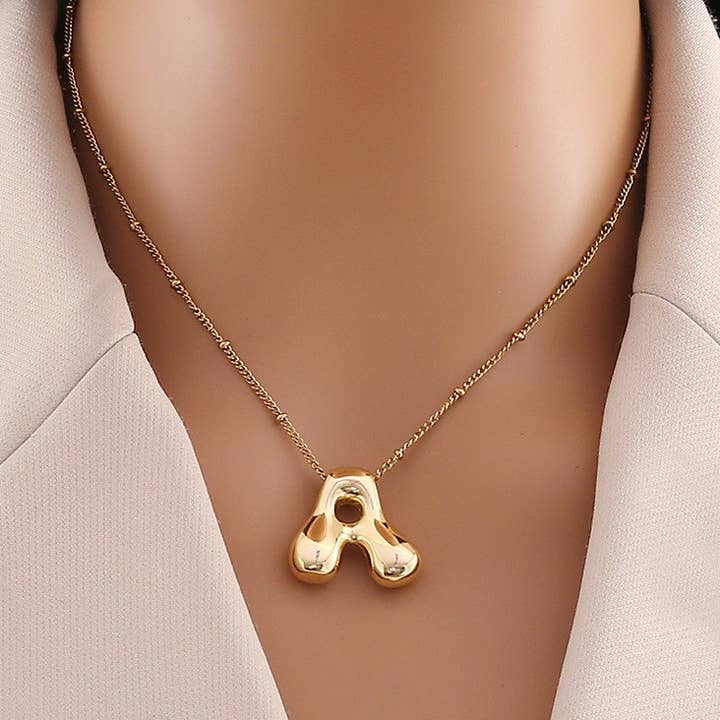 JOSSLYN by wall to wall - Wholesale Pendant/Charm Necklace - STAINLESS STEEL BALLOON BUBBLE INITIAL NECKLACE | 40NK316