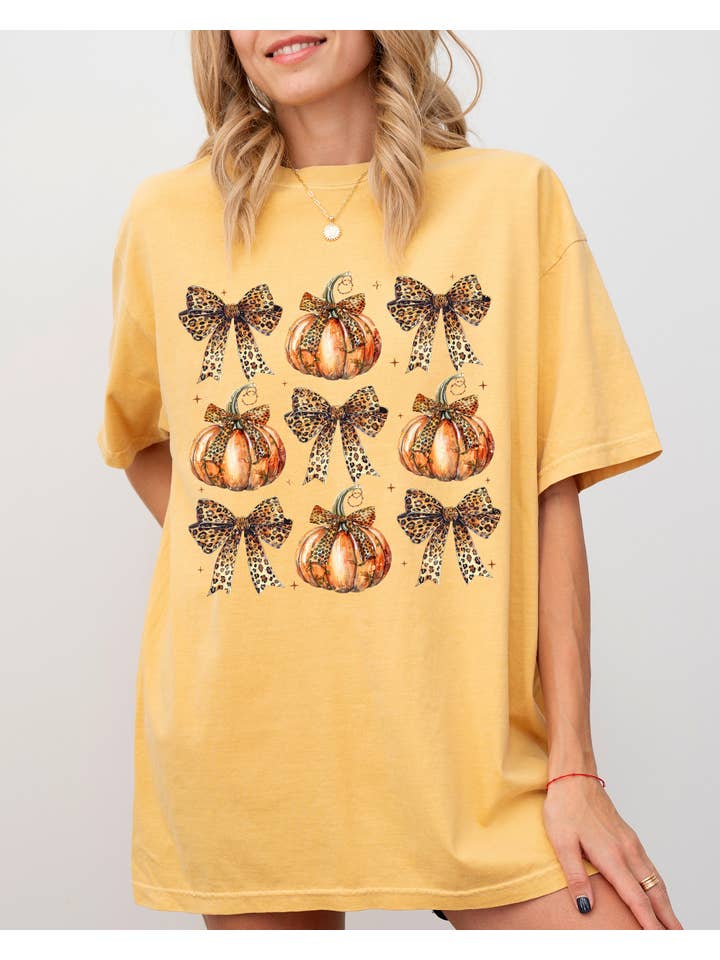 Refinery Number One LLC - Wholesale T-Shirt (Graphic) - Women's - Leopard Print Pumpkins Coquette Ribbons Halloween Shirt