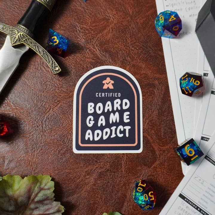 Minva Tabletop Design Co - Wholesale Sticker - Certified Board Game Addict Sticker