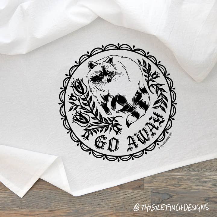 Raccoon Hex Sign Tea Towel for wholesale by Thistle Finch Designs