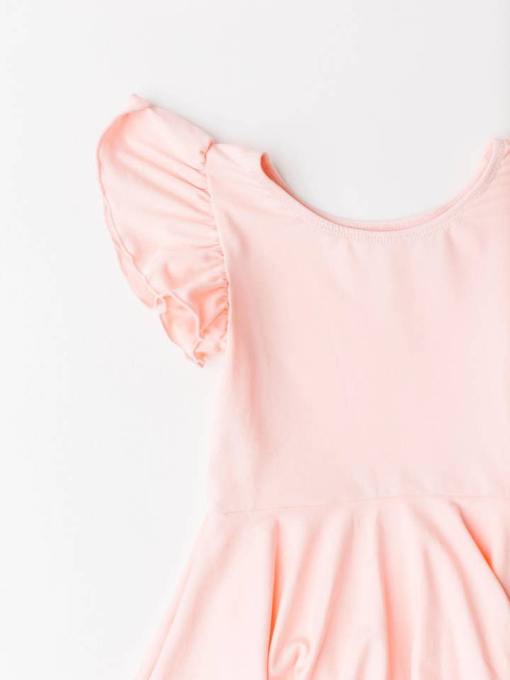 Mila & Rose - Wholesale Leotard - Kids - Peach S/S Twirl Leotard