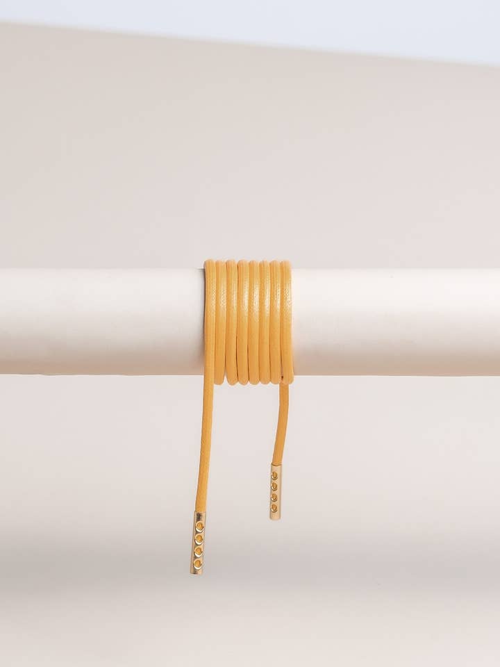 Yellow | Round waxed laces for wholesale by Senkels