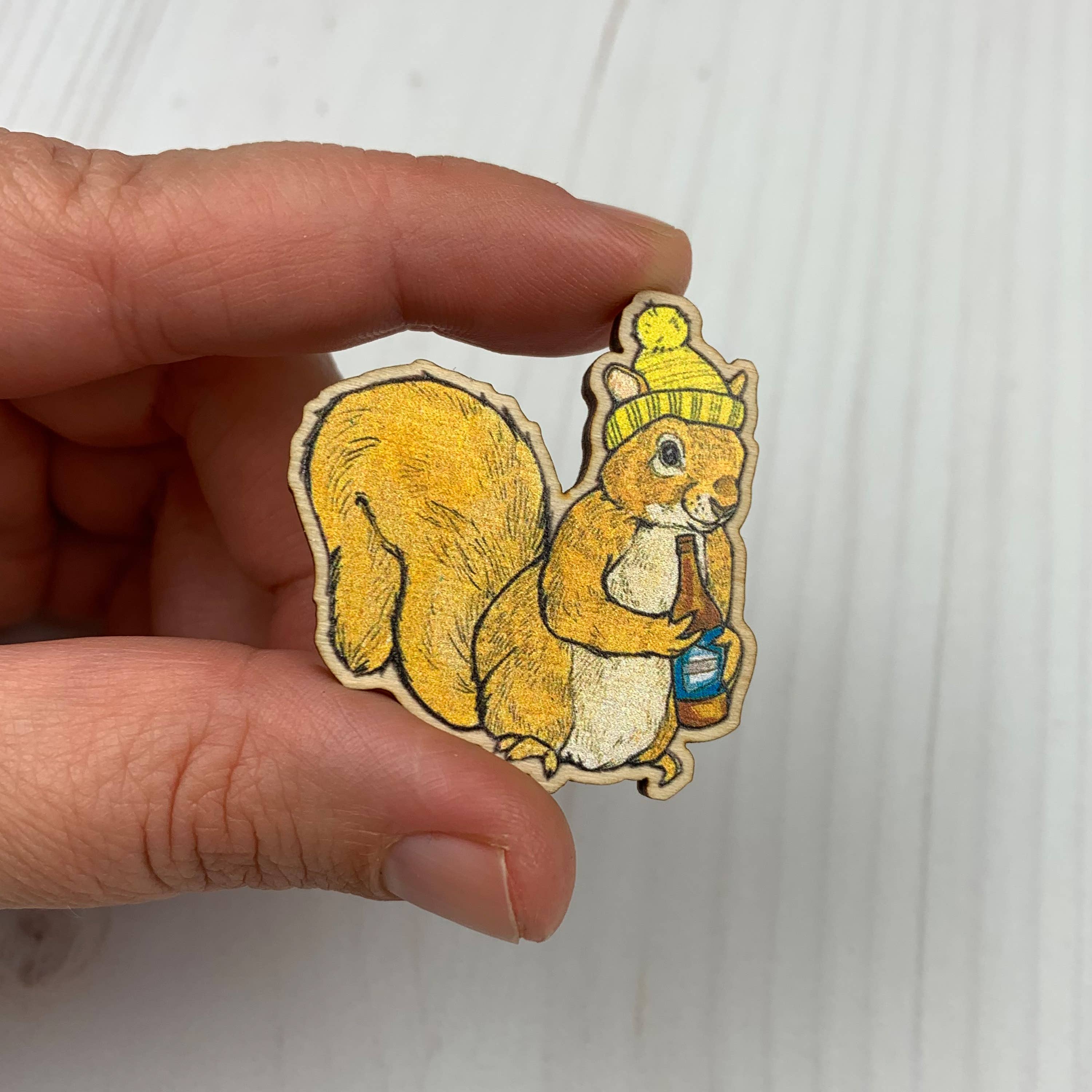 Sarah Draws Things - Wholesale Lapel Pin/Button - Beer Squirrel - 1.5" illustrated wooden pin2