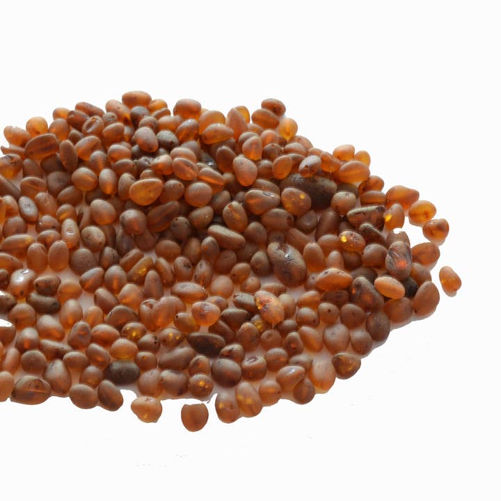 Loose Cognac Olive Raw Amber Beads for wholesale by The Natural Amber