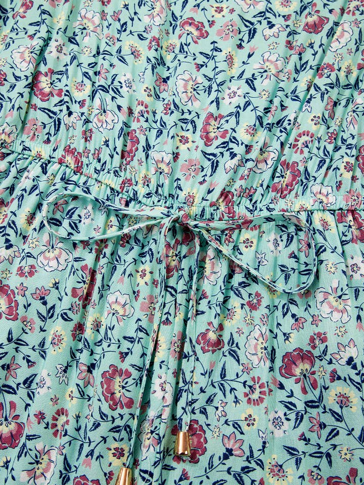 Green Bohemian Floral Ruffle Bottom Spaghetti Strap Jumpsuit for wholesale on Faire