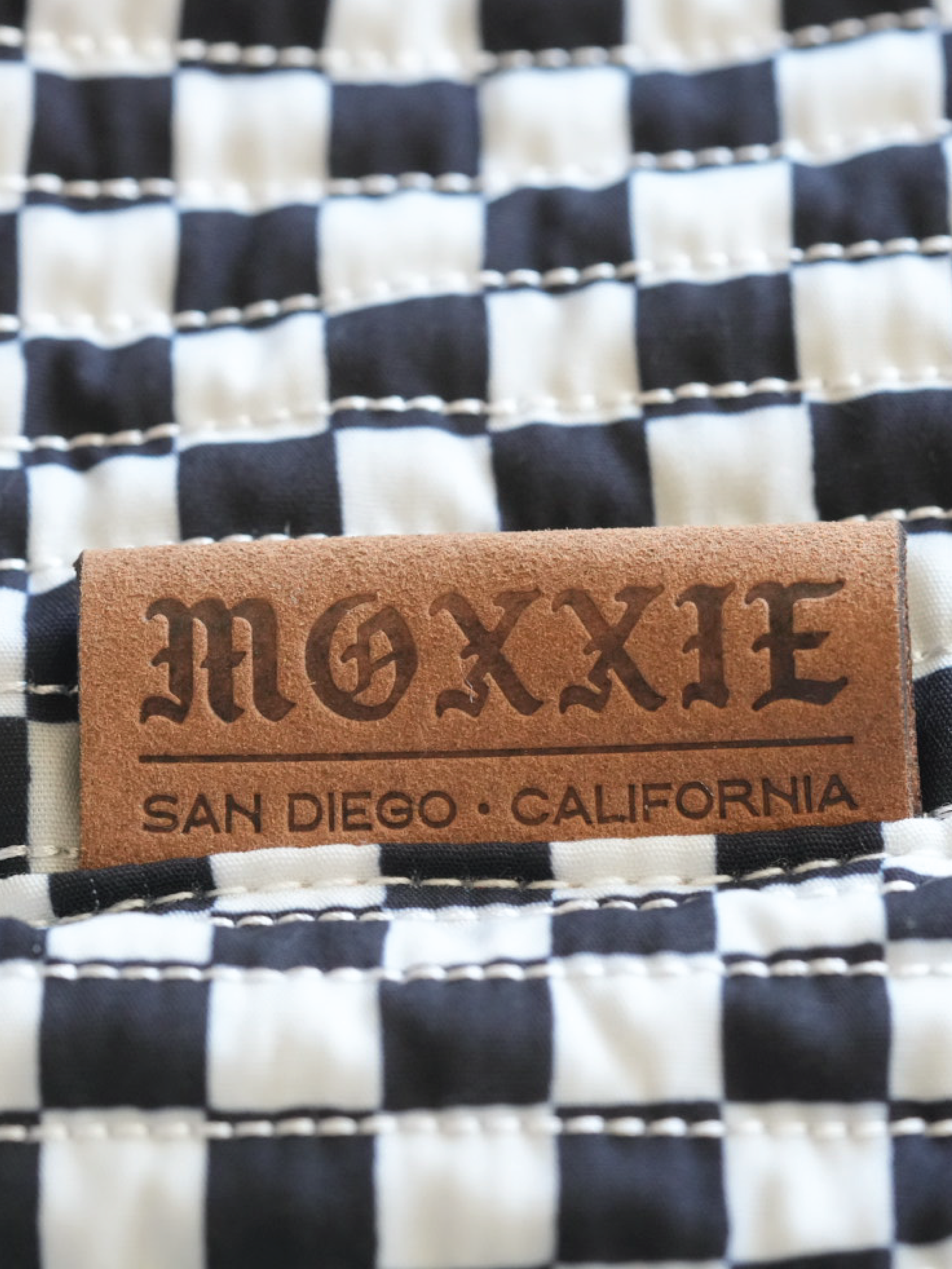 Black and White Pet Sling Carrier for wholesale on Faire2