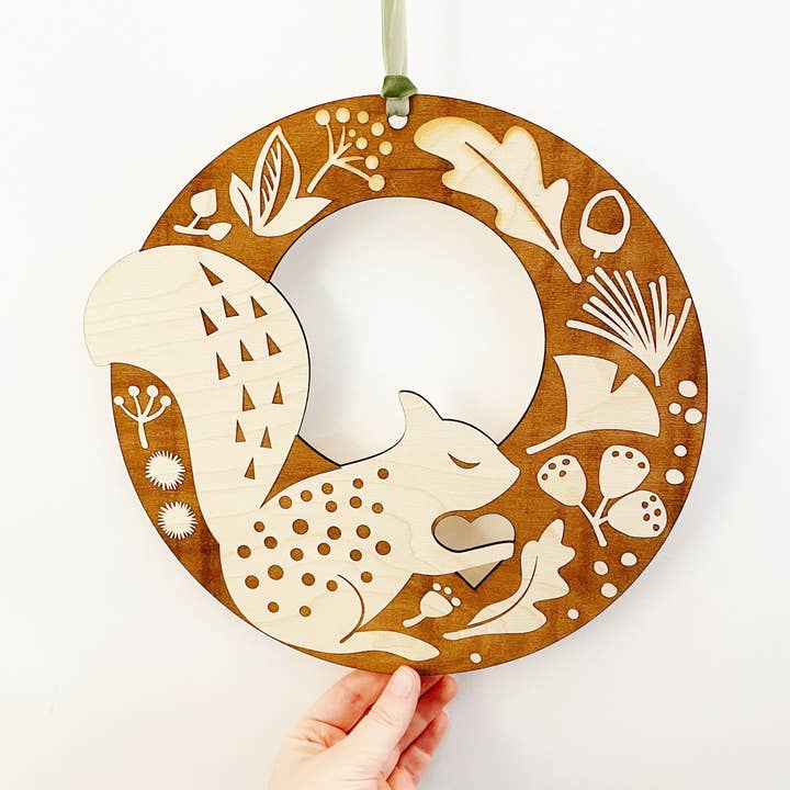 Wood Squirrel Wall Decor Wreath for wholesale by Remember November, Inc