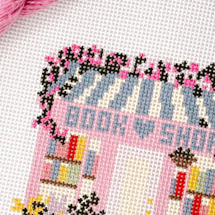 Cotswold Co Designs - Wholesale Embroidery/Cross Stitch Supplies - Ready to Ship Hand Painted Book Shop Storefront 6” Needlepoint Canvas 13 Mesh Reading Needlepoint Canvas Storefront Hand Painted1