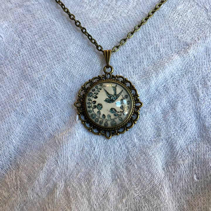 Bird and Flower Necklace for wholesale by The Atlas Rose And Key