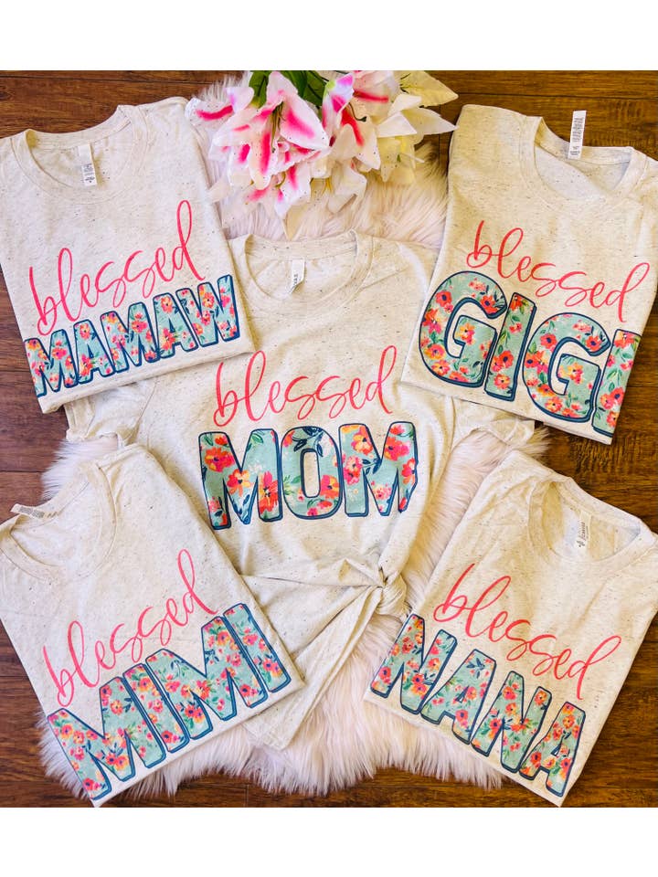 Oatmeal Blessed Floral Pick Your Name Tees for wholesale on Faire
