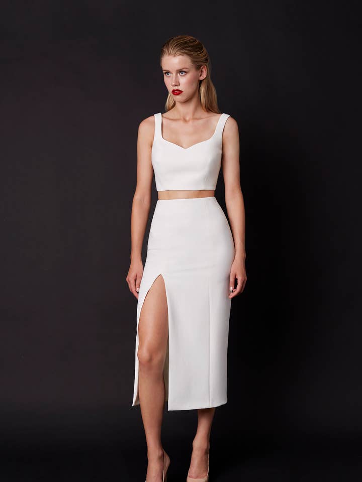 Noara White for wholesale by Nomi Fame