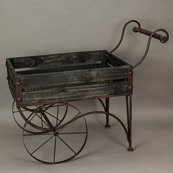 Zeckos - Wholesale Plant Pot Stand - 24 Inch Rustic Black Wood & Metal Wagon Plant Stand