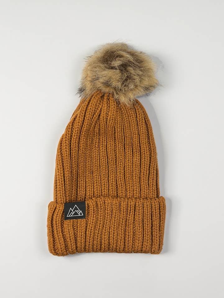 Knitted Pom Pom Beanie: Cinnamon for wholesale by Made of Mountains