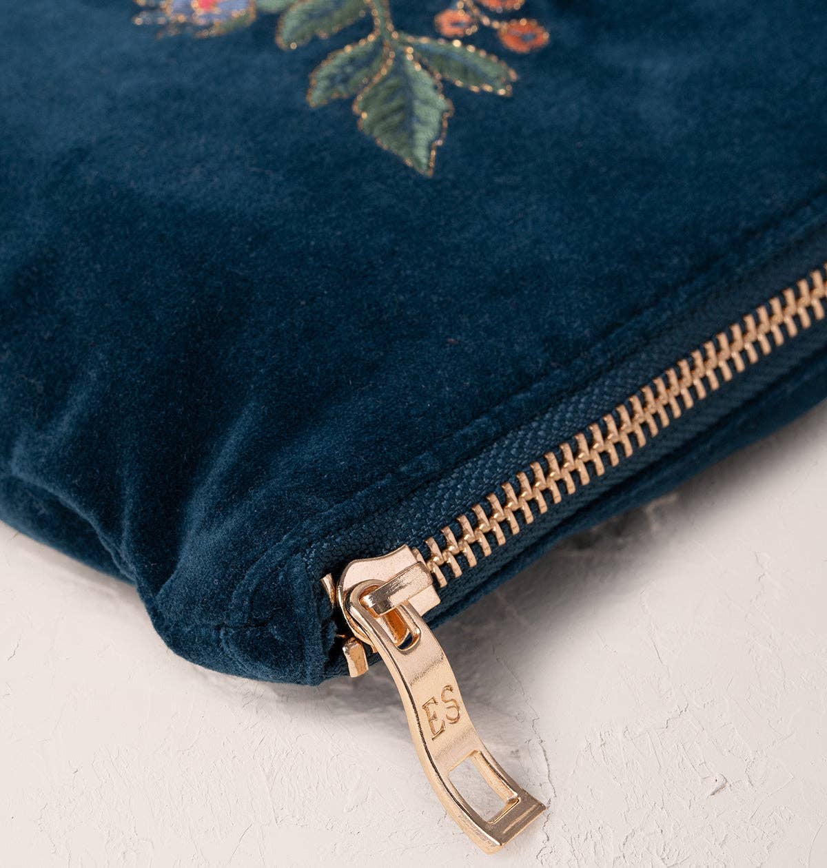 Ink Blue Botanical Garden Mini Pouch for wholesale on Faire2