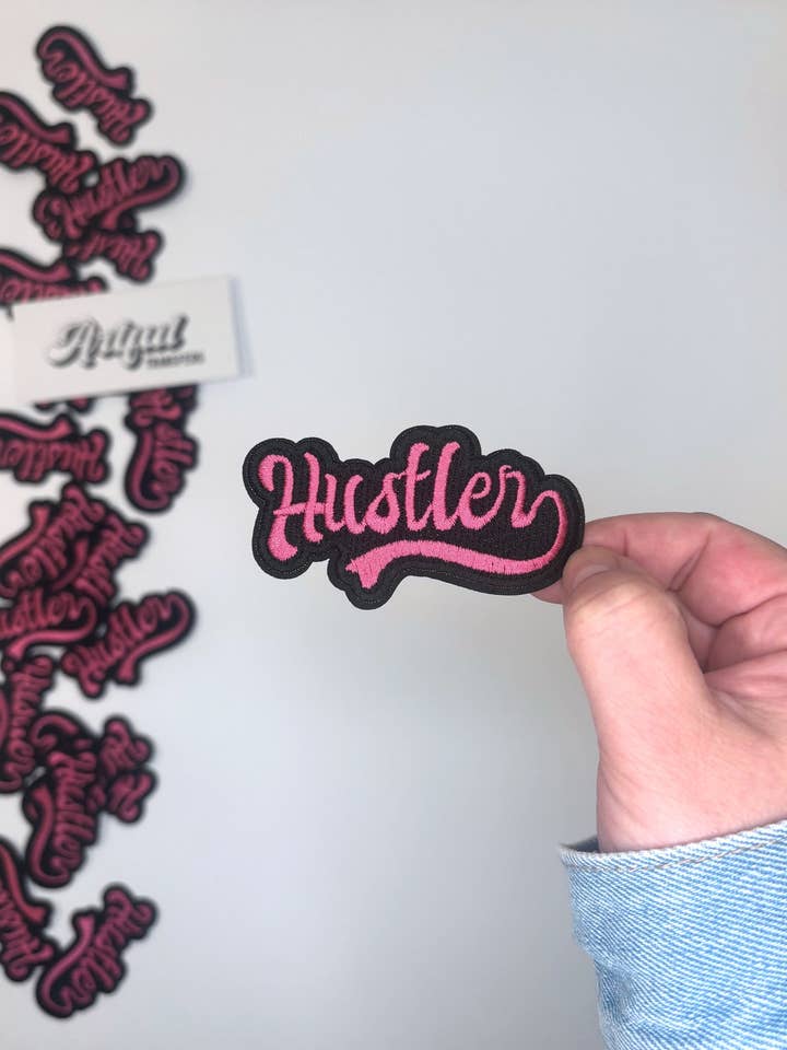 Hustler - Iron-on Patch for wholesale by Artful Transfers