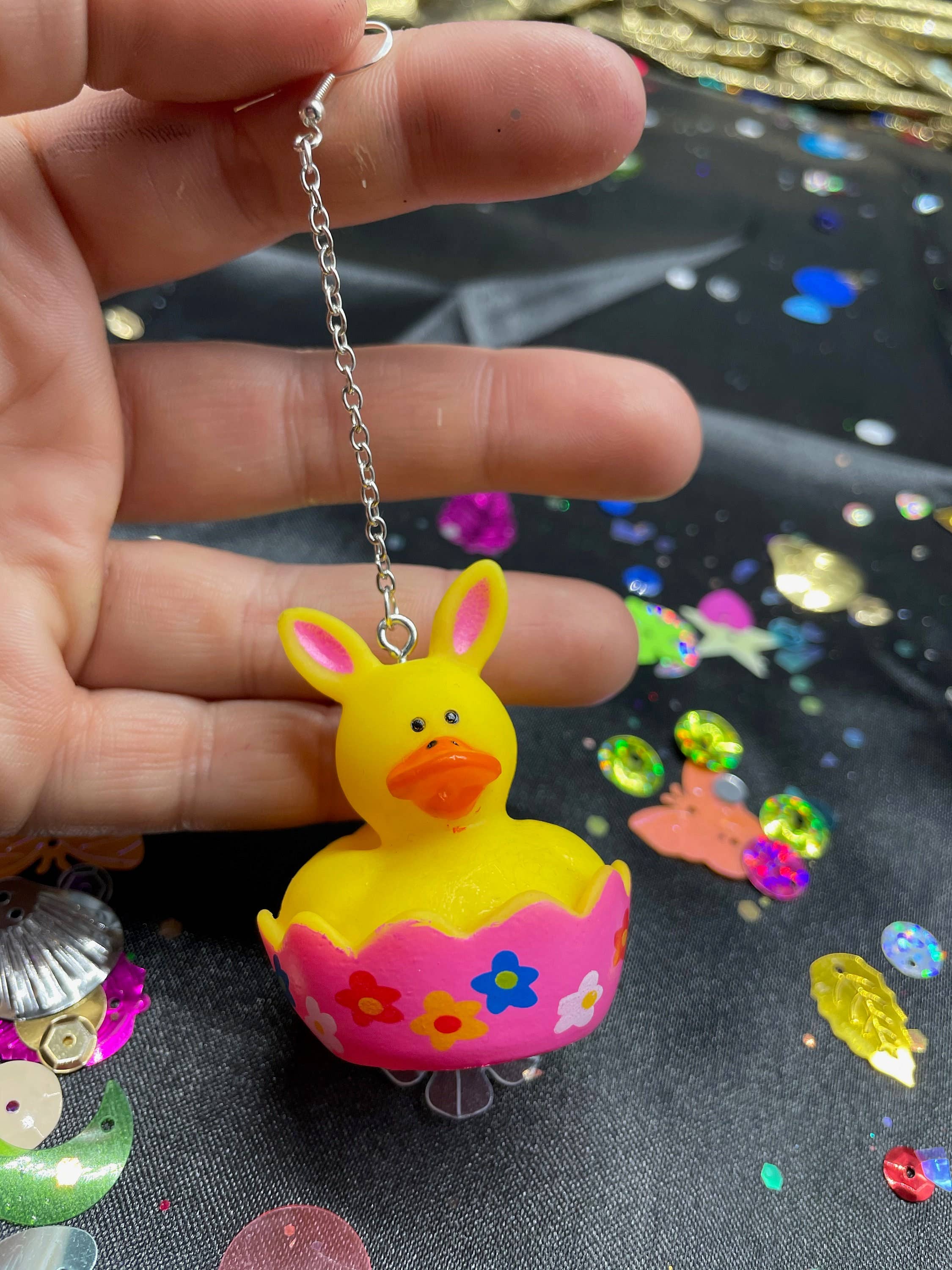 R59Creates – wholesale Dangle earrings – Easter Themed Lil Rubber Ducky Earrings! In Yellow Bunny, Blue Bunny, Pink Bonnet, And Purple Egg W/ Gold, Silver Or Silver Drop Chain!1