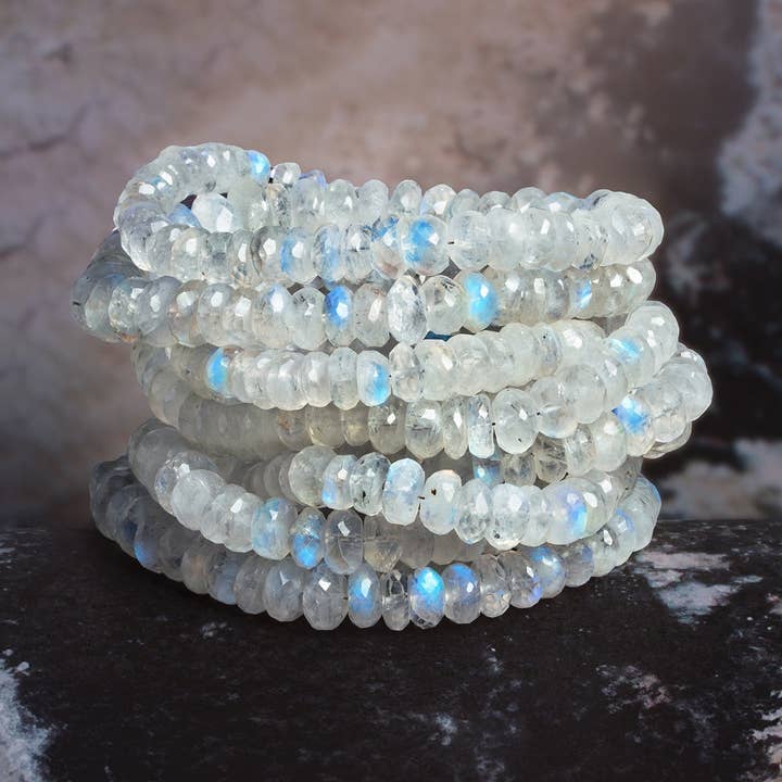 7-13mm Rainbow Moonstone Faceted Rondelle 16 inch 85 beads for wholesale by The Bead Traders