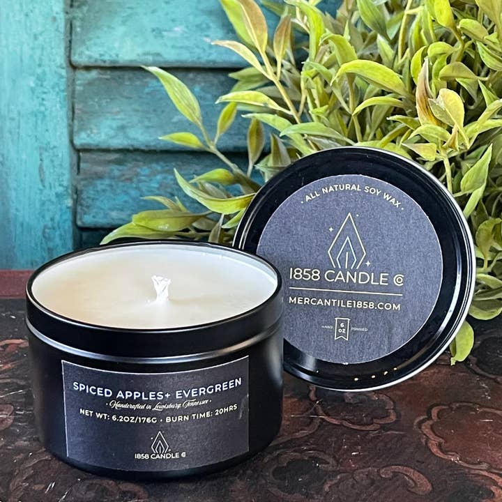 Spiced Apples + Evergreen 6 oz Candle in Travel Tin for wholesale by 1858 Candle Co