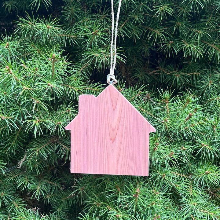 Handcrafted Cedar Wood House Christmas Ornament and other Purchase Wholesale cedar hangers. Free Returns & Net 60 Terms on Faire trending on Faire.