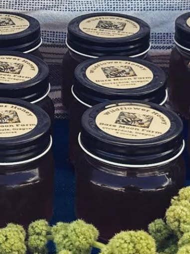 8 ounce Glass Jar of Wildflower Honey for wholesale by Bare Moon Farm