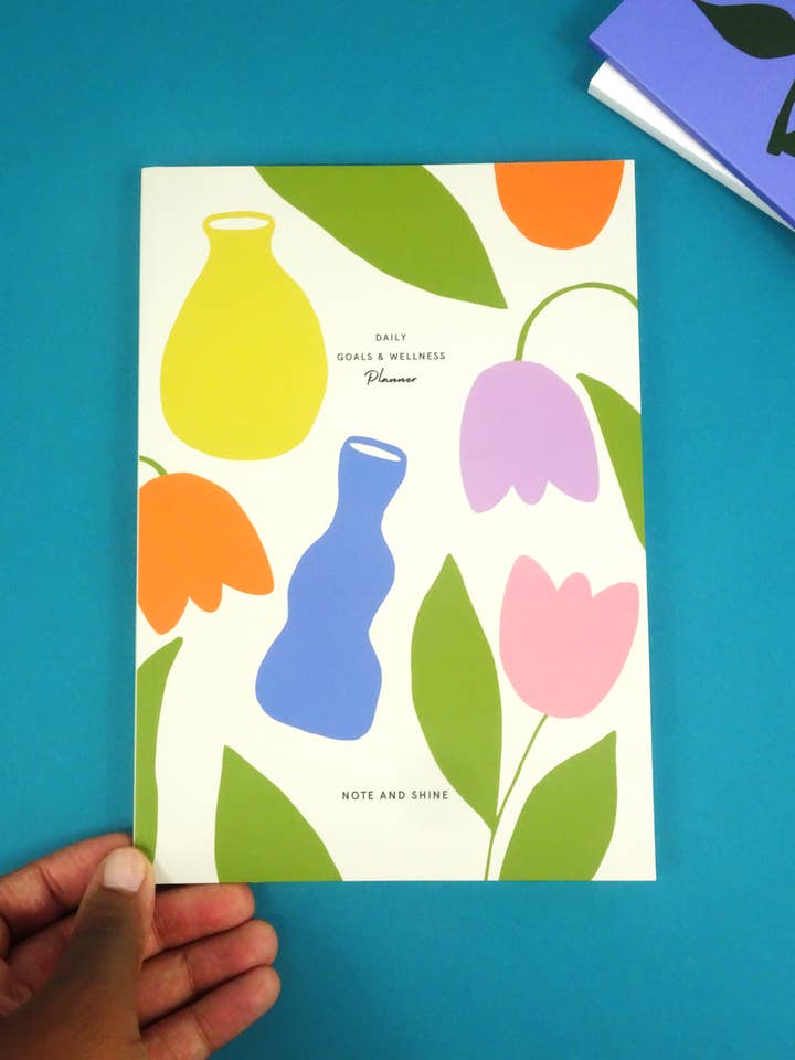 Daily Goals and Wellness Planner (Vase of Flowers) for wholesale by Note and Shine