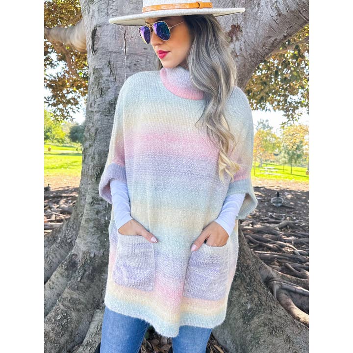 Ice Cream Soft Knit Short Sleeve Cozy Poncho with Pockets and other Purchase Wholesale mock cream. Free Returns & Net 60 Terms on Faire trending on Faire.