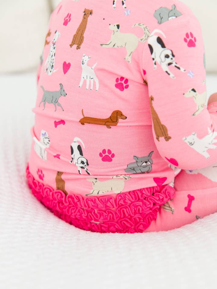 SoftSnooze™ Baby Girls Bamboo Viscose Pink Puppy Playtime Footed Ruffle One Piece Pajama
for wholesale on Faire1