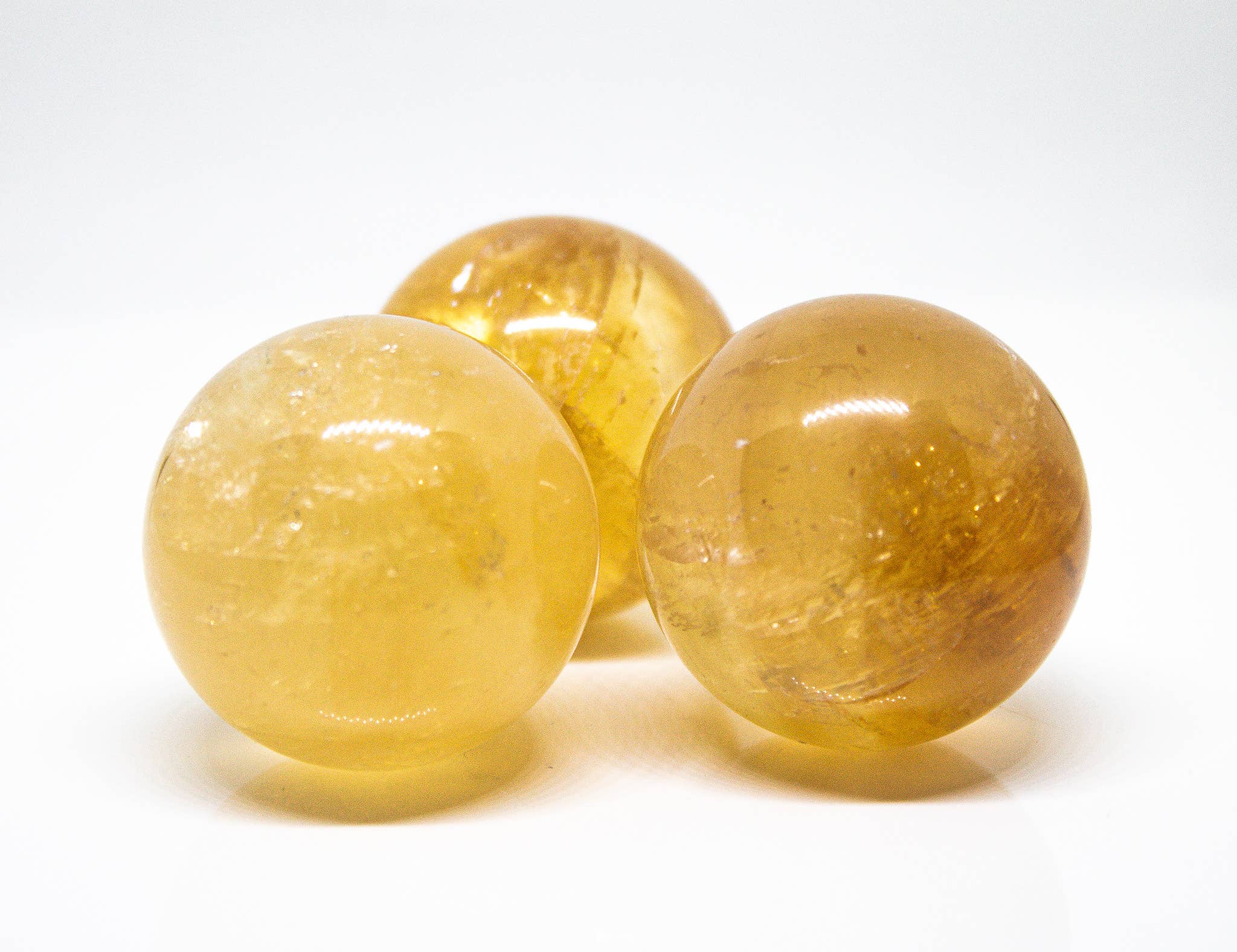 Quasar Gems USA - Wholesale Spiritual Stone/Crystal - Honey Amber Calcite Sphere 30mm