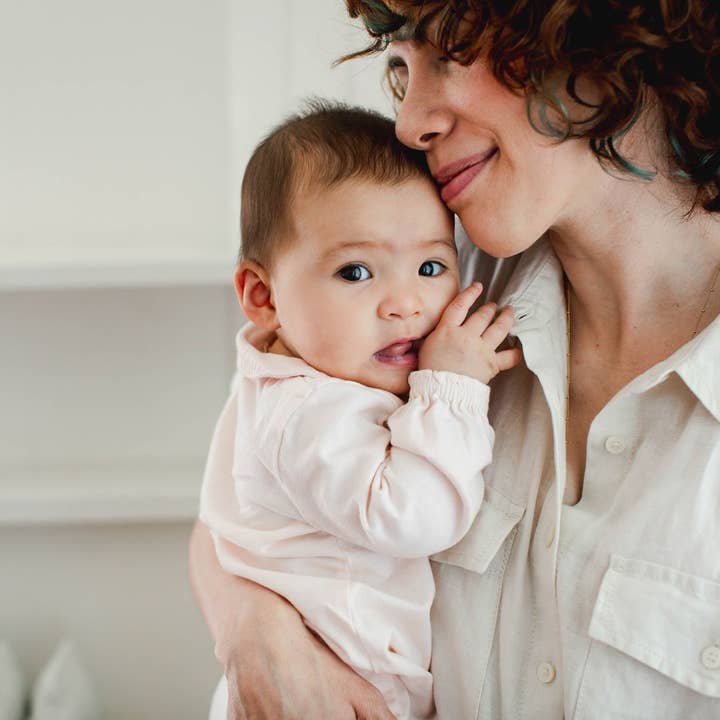 Angelic Muslin Collar Infant Girl Jumpsuit
for wholesale on Faire3