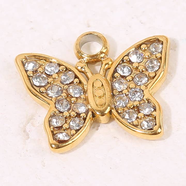 Set aus 3 vergoldeten Schmetterlingsanhängern mit Strass. für den Großhandel von JOYA