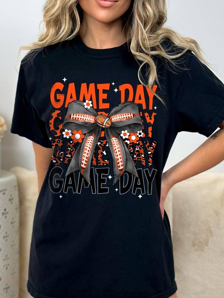 Orange Black Football GameDay Bow Garment Dyed Tee for wholesale by Pink Irene Wholesale